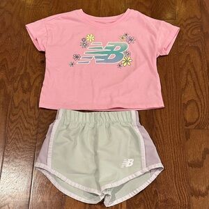 New Balance outfit. Size 2T. GUC. Some wear on shirt.